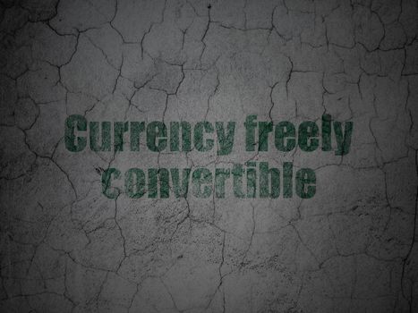 Currency concept: Green Currency freely Convertible on grunge textured concrete wall background