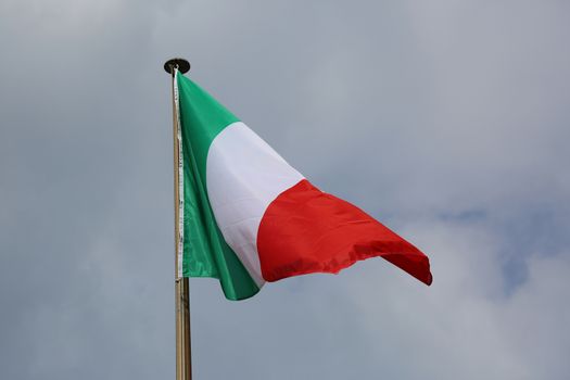 Italian Flag Against Blue Sky