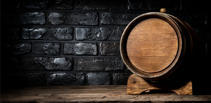 Wooden cask and wall made of bricks