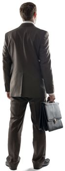 Back view of business man standing and holding briefcase isolated on white background