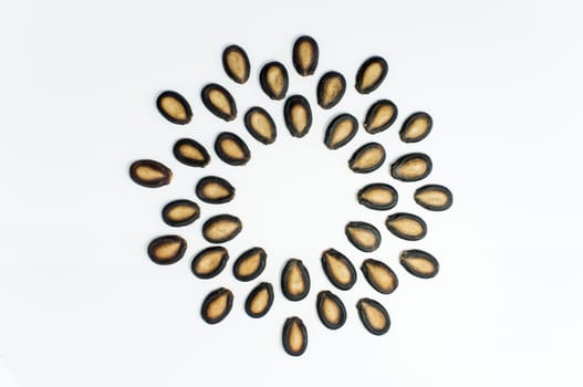 Watermelon seeds on white background