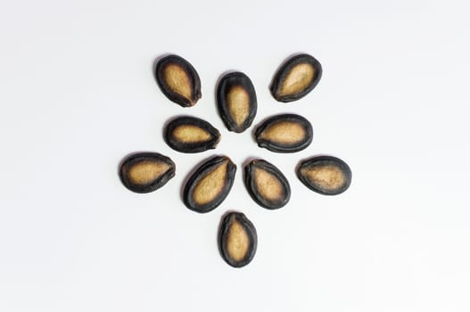 Watermelon seeds on white background