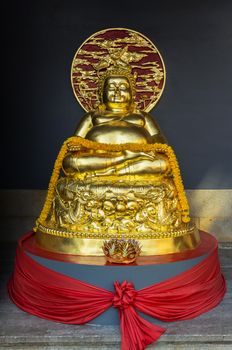 Golden buddha at at canton chinese Shrine temple in bangkok, thailand