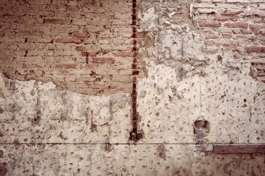 old cracked brick wall texture background. Vintage effect.