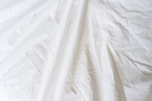 Background of crumpled dense fabric