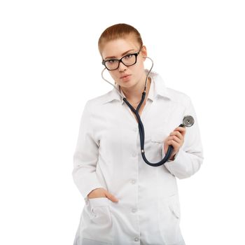 Young pretty female doctor in white uniform isolated on white background