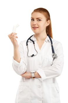Young beautiful female doctor in white uniform with inhaler isolated on white background