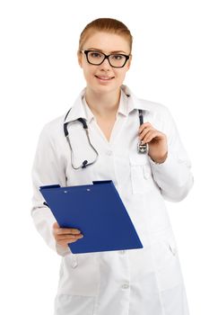 Young pretty female doctor in white uniform isolated on white background