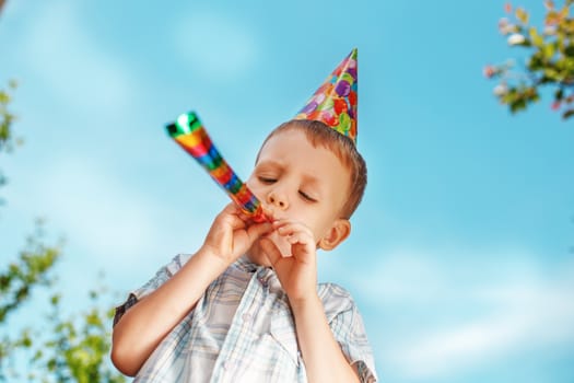 Little boy having fun and celebrating birthday