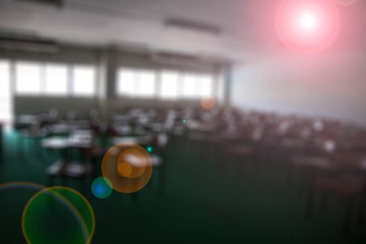 chairs in the big classroom blurred Lens flare background