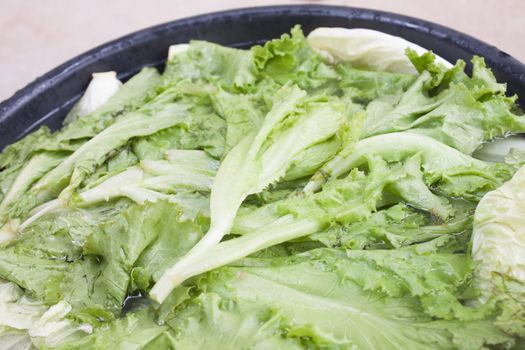 Stir salad soaking water before cooking.