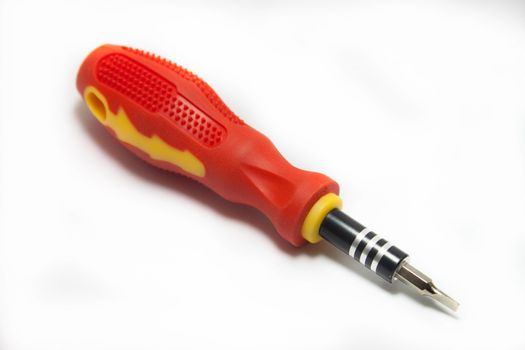 Screwdriver red white background. Construction