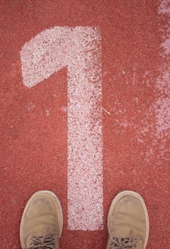 Standing on track No. 1 football field.