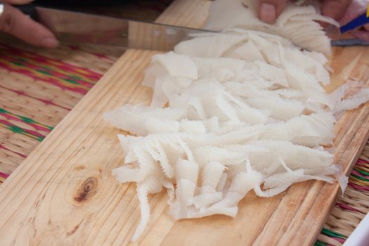 sliced ​​on the cutting board for raw tripe cooking.