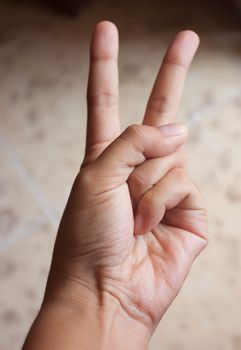 Two women held hands fingers