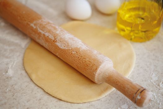 Preparing pizza dough and / or pasta, dumplings, ravioli, dumplings in a restaurant or home