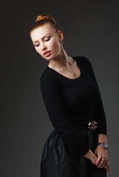 Portrait of a adorable sexy red-haired girl with plump lips. Natural Lip Plumper. Pretty smooth straight posture
