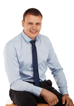 Portrait of a young handsome man in a representative strict clothing smiling isolated on white background