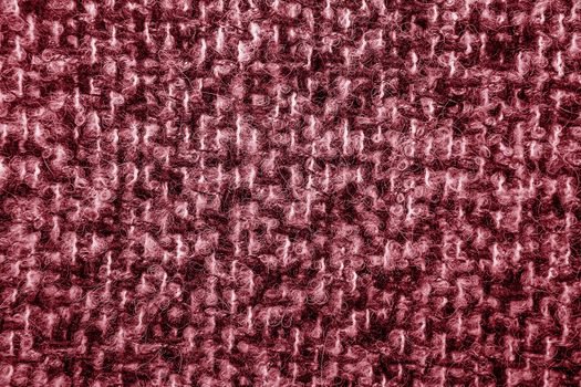 crimson tweed like texture, red wool pattern, textured melange upholstery fabric background copy space. Background texture of twill