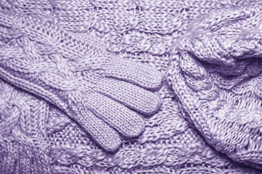 Set of Wool sweater or scarf, hat and gloves texture close up. Knitted jersey Fabric background with a relief pattern. Braids in machine knitting pattern. Wool hand-knitted or machine knitting pattern.