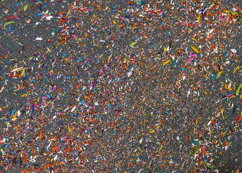 Slate Tray Texture background with pencil crayons shavings. texture of natural black slate rock