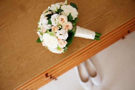 Wedding still life - Bridal bouquet and bride's shoes