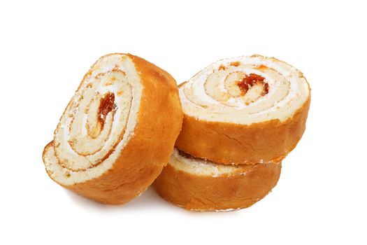 Slices of sweet roll cake isolated on white background
