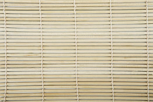 sushi matt background abstract texture. Macro fragment of bamboo mat for making sushi