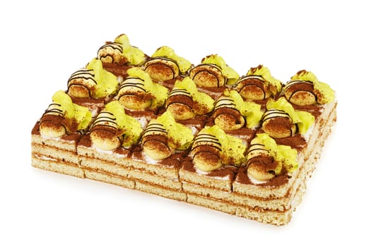 biscuit cake decorated with cream fruits isolated on white background
