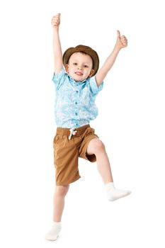 Little boy jumping and having fun isolated on white background. Positive emotions.