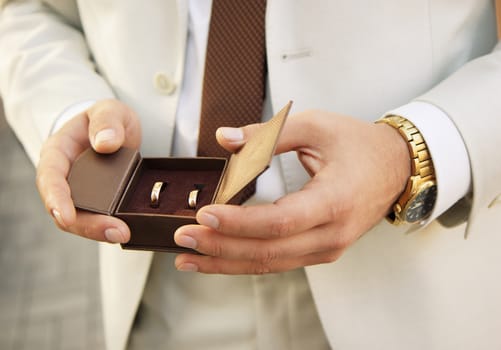 golden wedding rings in a box