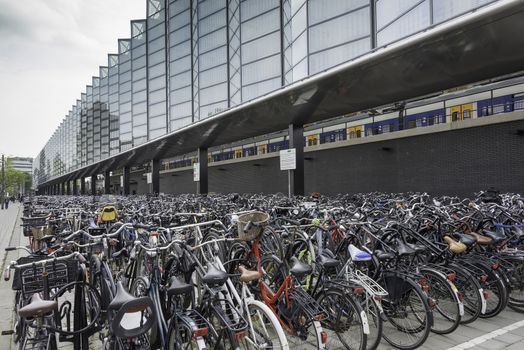 ROTTERDAM,HOLLAND-MAY 18, new bicycle storage for thousand of bikes at the backsite of the new build rotterdam central station on May 18 2016 in Rotterrdam, this station is opened in end 2015