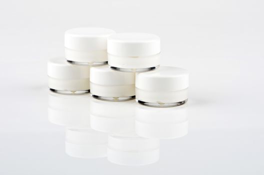 Blank white facial cream jar isolate on white background