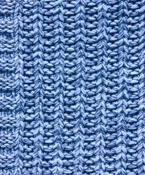 texture of knitted fabric, knitted color background, Melange wool knitwear as a background.