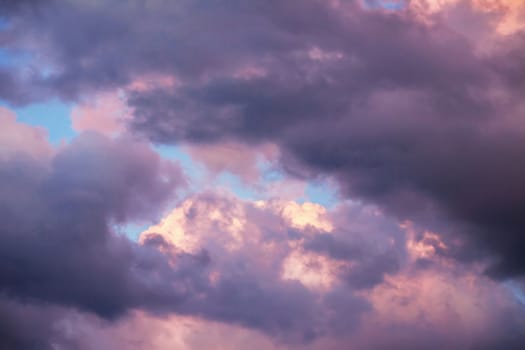 colorful dramatic sky with clouds at sunset for background and texture