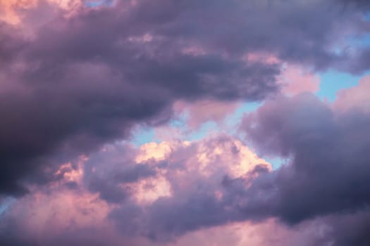 colorful dramatic sky with clouds at sunset for background and texture
