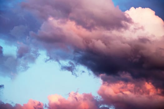 colorful dramatic sky with clouds at sunset for background and texture