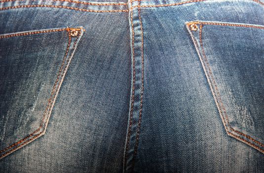 ass beautiful women in tight jeans, women's buttocks in blue jeans close-up, soft focus
