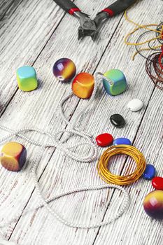 chain,pair of scissors and set of beads for jewelry