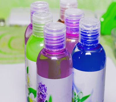 Group cosmetic bottles, cosmetic liquid, shower gels, shampoos, cosmetics and bottles for liquid soap