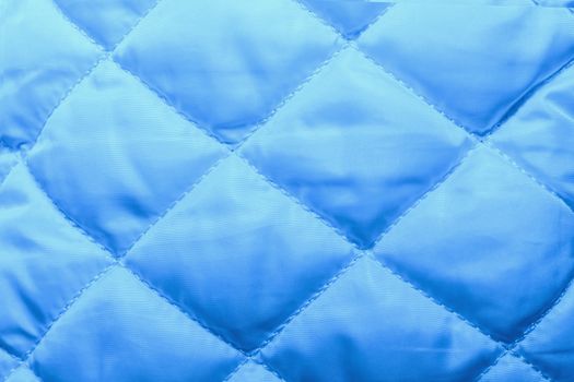 quilted fabric texture of bluecolor for hammering, backgrounds and textures