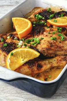 Chicken breast baked with oranges in the oven