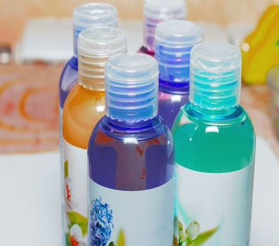 Group cosmetic bottles, cosmetic liquid, shower gels, shampoos, cosmetics and bottles for liquid soap