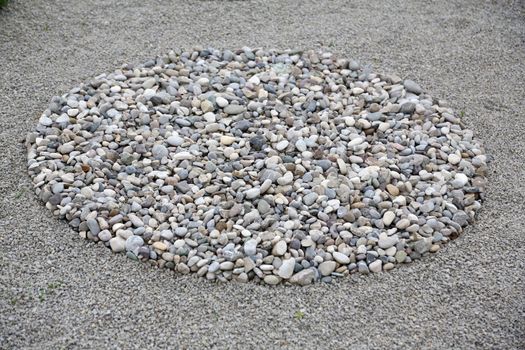 Garden design, with hard landscaping, using shaping, paving, rocks and pebbles