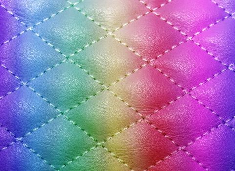 quilted texture artificial leather, color gradient, rainbow, stitched with thread for the background for texture