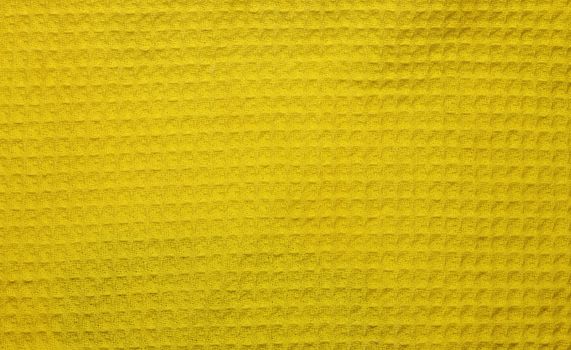 waffle cotton fabric texture background yellow abstract background, textured cloth towels