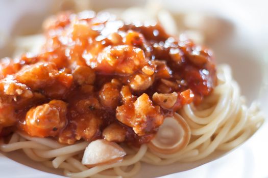 Spaghetti with tomato sauce.