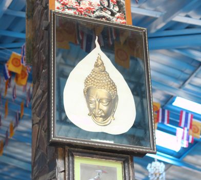 thailand Buddha in gold frames.