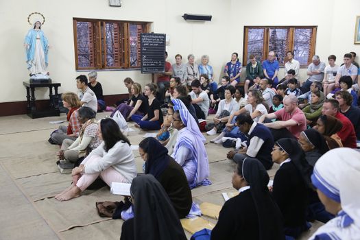 Sisters of Mother Teresa's Missionaries of Charity and volunteers from around the world at the Mass in the chapel of the Mother House, Kolkata, India at February 15, 2014.