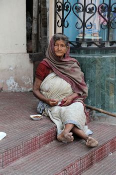Beggars in front of Nirmal, Hriday, Home for the Sick and Dying Destitutes, one of the buildings established by the Mother Teresa and run by the Missionaries of Charity in Kolkata, India on February 10, 2014.